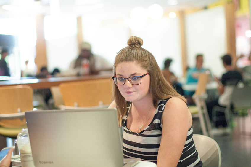 student using laptop